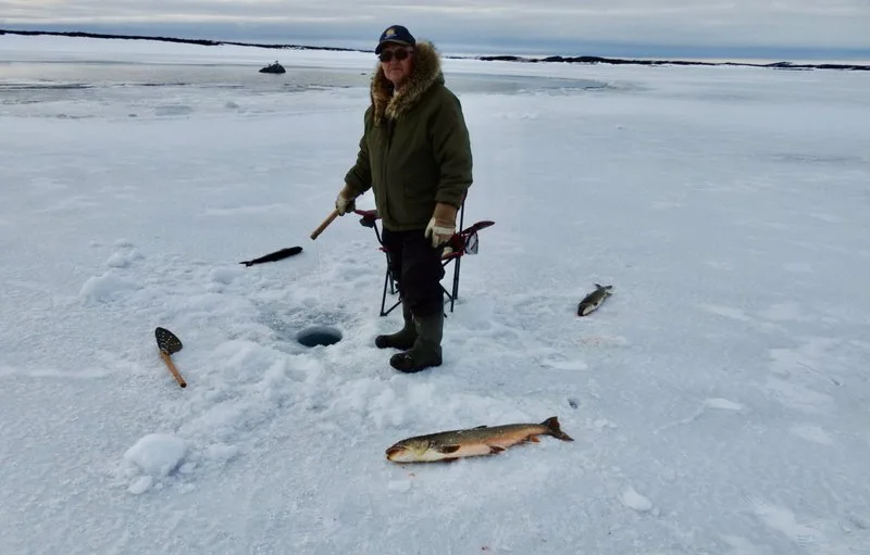 Canada's Frozen Frontier Beckons Adventurers to Test Their Ice Fishing Skills in Canada